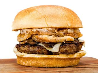 Product: Infused with mushrooms, A1 steak sauce and topped with Tabasco fried onions - Gimme A Burger in Deerfield Beach - Deerfield Beach, FL Hamburger Restaurants