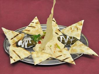 Product: Vegatarian Dolmeh and Hummus - Good Karma Restaurant in Park City, UT Indian Restaurants