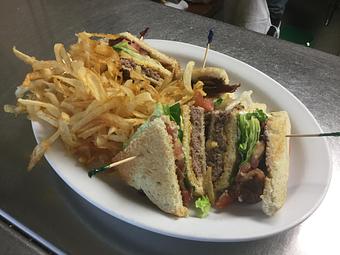 Product: Harold's Club Burger and laces. - Harold's Koffee House in Omaha, NE American Restaurants