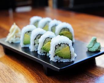 Product: nori seaweed wrapped with sushi rice, cucumber and avocado. topped with sesame seeds. sliced into eight pieces and served with soy sauce, pickled ginger and wasabi - Hub 51 in River North - Chicago, IL American Restaurants