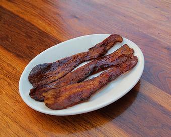 Product: three thick cut slices of brown sugar bacon - Hub 51 in River North - Chicago, IL American Restaurants