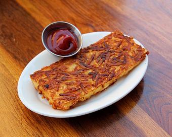 Product: housemade shredded hash browns served with ketchup - Hub 51 in River North - Chicago, IL American Restaurants