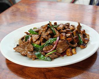 Product: classic preparation of mongolian beef with red onion, mushroom and scallion served over crispy rice noodles. served with white rice - Hub 51 in River North - Chicago, IL American Restaurants