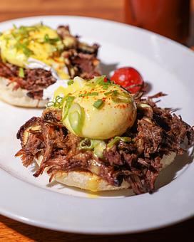 Product: Slow braised short rib, english muffin, poached egg, hollandaise - Hub 51 in River North - Chicago, IL American Restaurants