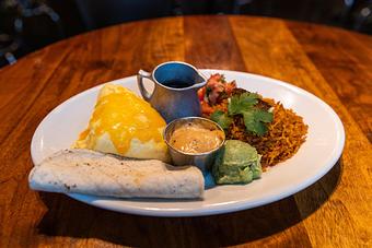 Product: build-you-own tacos are served with soft scrambled eggs with cheddar cheese, spanish rice, sour cream pico de gallo, guacamole, cilantro, chipotle mayo and corn tortillas - Hub 51 in River North - Chicago, IL American Restaurants