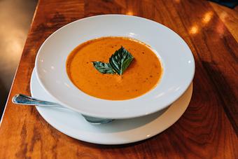 Product: house-made with crushed San Marzano tomatoes, garlic, finished with fresh basil - Hub 51 in River North - Chicago, IL American Restaurants