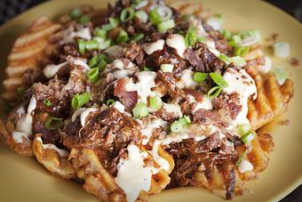 Product: Roadhouse Fries, waffle fries made even better - Hwy 61 Roadhouse & Kitchen in Saint Louis, MO Barbecue Restaurants