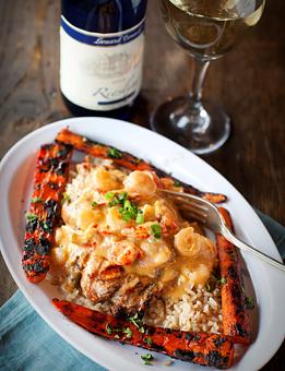 Product: Bourbon St. Chicken with grilled carrots - Hwy 61 Roadhouse & Kitchen in Saint Louis, MO Barbecue Restaurants