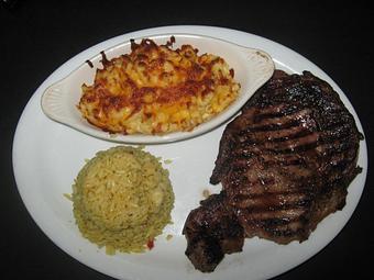 Product: Served with Rice Pilaf and Homemade Mac & Cheese - Irish Bred Pub in Hapeville, GA American Restaurants