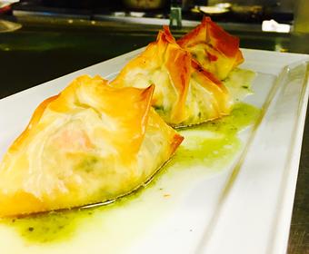 Product: Fresh Lobster, Shrimp and Goat Cheese stuffed Phyllo dough served with Basil Oil and Buerre Blanc - JJ's Restaurant in Kansas City, MO French Restaurants