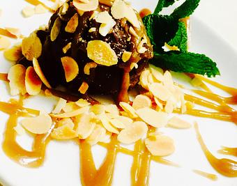 Product: House Made Chocolate Ganache with Rum caramel and Toasted Almonds - JJ's Restaurant in Kansas City, MO French Restaurants