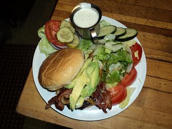 Product: This fabulous burger got it's name because it's so good that all you can say after biting into it is OMG. - Johnny's Bar & Grill in Hollister, CA American Restaurants