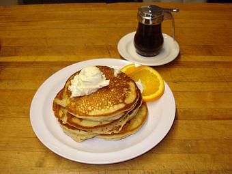 Product: Our pancakes are light fluffy. - Johnny's Bar & Grill in Hollister, CA American Restaurants