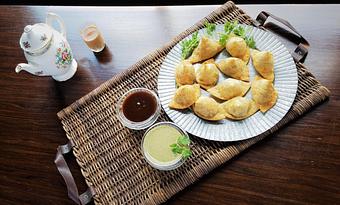 Product: samosa with chutney - Kama Bistro in La Grange, IL Indian Restaurants Product: samosa with chutney - Kama Bistro in La Grange, IL Indian Restaurants