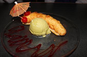 Product: Banana Tempura and green tea ice cream - Kaneyama Japanese Restaurant & Sushi Bar in Houston, TX Japanese Restaurants