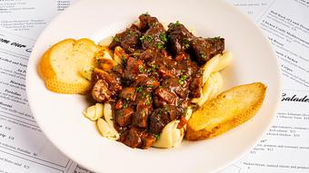 Product: Pasta: Beef Bourguignon over Casarecce - La Baguette Bistro in Oklahoma City, OK Bakeries