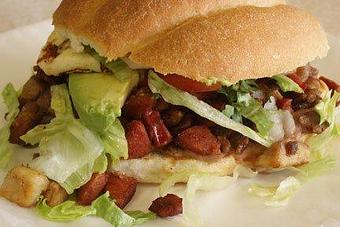 Product: Sandwich served on Mexican style Telera bread with your choice of Meat, Refried Beans, Onion, Cilantro, Lettuce, Tomato, Queso Blanco and Avocado! - La Lupita Tacos Mexicanos in Olneyville - Providence, RI Mexican Restaurants