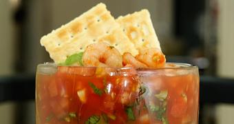 Product: Served refreshingly chilled in Tomato Juice and garnished with Avocado, Tomato, Onion, Cilantro, Valentina Hot Sauce & Ketchup - La Lupita Tacos Mexicanos in Olneyville - Providence, RI Mexican Restaurants