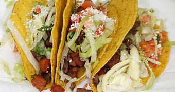 Product: Steak and Chorizo Mixed Taco Shells (Regular) Crispy Corn shells with Meat, Onion, Cilantro, Lettuce, Tomato & Cotija Cheese (3 per order) - La Lupita Tacos Mexicanos in Olneyville - Providence, RI Mexican Restaurants