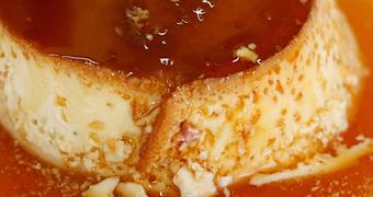 Product: A family recipe, sweet type of custard made with our secret mix of Milk, Vanilla, Eggs then drizzled with Syrup - La Lupita Tacos Mexicanos in Olneyville - Providence, RI Mexican Restaurants