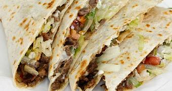 Product: A Flour Tortilla with your choice of Grilled Steak, Mozzarella, Lettuce and Tomato - La Lupita Tacos Mexicanos in Olneyville - Providence, RI Mexican Restaurants