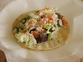 Product: Steak Taco (Extra) Onion, Cilantro, Lettuce, Tomato, Cotija Cheese - La Lupita Tacos Mexicanos in Olneyville - Providence, RI Mexican Restaurants