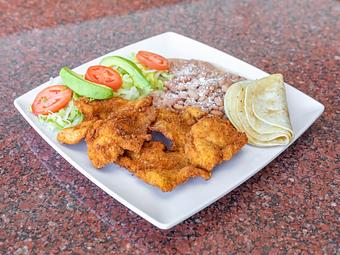 Product: Chicken breast covered in breadcrumbs then pan-fried, served with (5) Corn Tortillas and (2) Sides - La Lupita Tacos Mexicanos in Olneyville - Providence, RI Mexican Restaurants