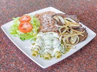 Product: Spicy Enchiladas (3) Rolled Corn Tortillas doused in Green Hot Sauce and garnished with Onions, Sour Cream & Cotija Cheese. Served with your choice of Meat and (2) Sides - La Lupita Tacos Mexicanos in Olneyville - Providence, RI Mexican Restaurants