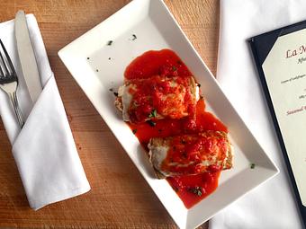 Product: Stuffed with ricotta & topped with mozzarella in a fresh tomato basil sauce - La Mezzaluna in Princeton, NJ Italian Restaurants