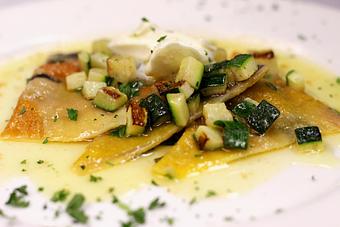 Product: Squash & coriander Ravioli served in brown butter sauce with fresh basil - La Mezzaluna in Princeton, NJ Italian Restaurants