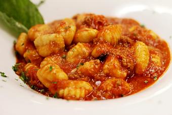 Product: Fresh gnocchi tossed in a hearty, homemade beef ragout - La Mezzaluna in Princeton, NJ Italian Restaurants