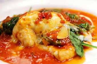 Product: Cooked in a light marinara with basil & topped with baby spinach, ricotta & fresh mozzarella - La Mezzaluna in Princeton, NJ Italian Restaurants