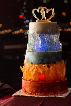 Product: A custom wedding cake with a fire and ice theme.  We also do custom occasion cakes and weddings cakes too! - La Patisserie Francaise in Northridge Shopping Center Near Target - Arvada, CO Bakeries