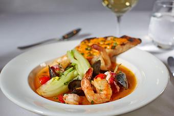 Product: with shrimp, lobster, mussels, saffron, fennel, potatoes, and rouille - La Tour Restaurant in Vail, CO French Restaurants