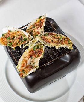 Product: Hibachi BBQ Oysters with butter, garlic, parsley, bacon, parmigiano-reggiano, and lemon - La Tour Restaurant in Vail, CO French Restaurants