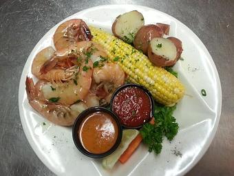 Product - Lagniappe Cajun Creole Eatery in Marquette, MI Seafood Restaurants