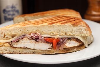 Product: Philly Chicken Panini - Lakeview Brew Coffee Cafe in New Orleans, LA American Restaurants