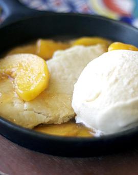 Product: Peach Cobbler and Vanilla Ice Cream - Leal's Mexican Restaurant in Plainview, TX Mexican Restaurants