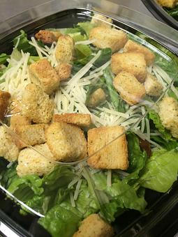 Product: Fresh romaine lettuce, shredded parmesan and crunchy coutons caesar dressing on the side - Macon Pizza Company in Macon, GA Pizza Restaurant