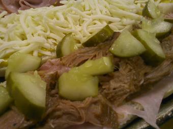 Product: Cuban Grinder - Mancino's Pizzas and Grinders in across from Gilles - Fond du Lac, WI Pizza Restaurant