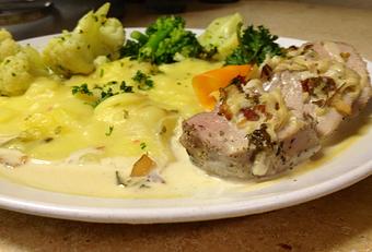 Product: Our Pork Loin with White Wine and Onions Sauce - Margaret's German Restaurant in The Farm Shopping Center - Tulsa, OK European Cuisine