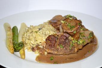 Product: Osso Bucco on a bed of Risotto with Asparagus - Margaret's German Restaurant in The Farm Shopping Center - Tulsa, OK European Cuisine