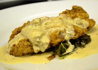 Product: Veal Wiener Schnitzel with Morel Mushroom Sauce - Margaret's German Restaurant in The Farm Shopping Center - Tulsa, OK European Cuisine