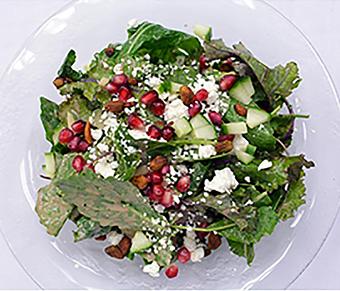 Product: Baby Kale Salad, Pomegranate, Cucumber, Pistachio, Feta, Balsamic - Copper Lounge in Los Angeles, CA Bars & Grills