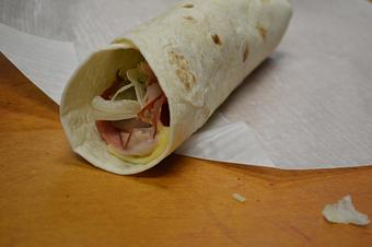 Product: Italian wrap: Ham, pepperoni & salami with provolone & Swiss cheeses plus lettuce in a tortilla. - Mario's Pizza & Grill in Knoxville, TN Pizza Restaurant