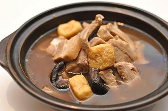 Product: Traditional Singaporean pork bone soup with Shiitake mushrooms, tofu and pork stomach - Merlion Restaurant & Bar in Cupertino, CA Bars & Grills