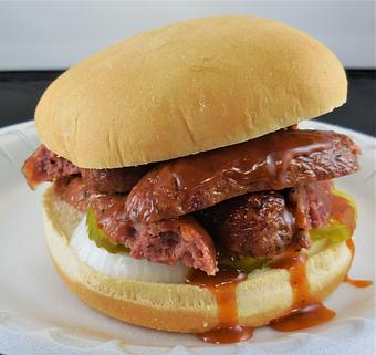 Product: Beef sausage sandwich. - Meyer's Elgin Smokehouse in Elgin, TX Barbecue Restaurants