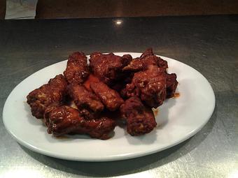 Product: 12 Piece order of our Regular Hot Wings tossed in Frank's Hot Sauce, Delicious!!! - Mi Amore Pizza and Pasta in Lompoc, CA Pizza Restaurant