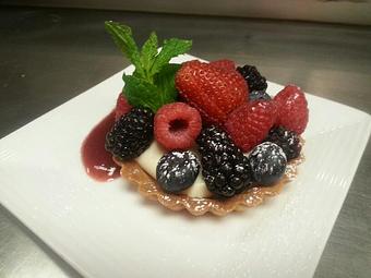 Product: Fresh mixed berries over a marscapone filling in a flakey crust - Michael Anthony's at the Inn in Versailles, OH Restaurants/Food & Dining