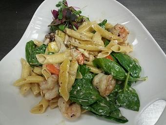 Product: Garganelli pasta with sauteed gulf shrimp, heirloom carrots, cherry tomatoes, wild mushrooms, and fresh spinach in a white wine and fresh thyme cream sauce - Michael Anthony's at the Inn in Versailles, OH Restaurants/Food & Dining